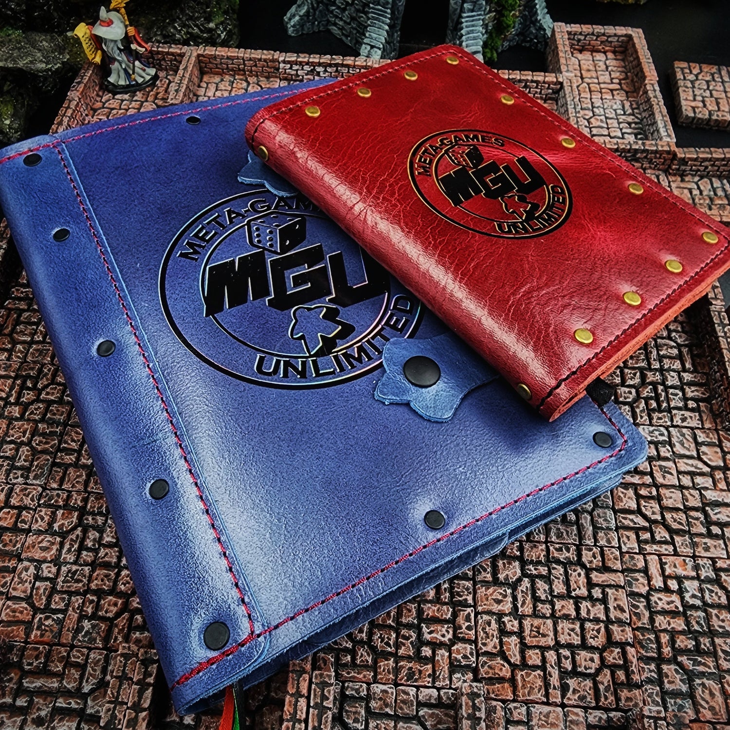 Handmade leather adventure journals in A5 and pocket sizes with paper refill inserts.