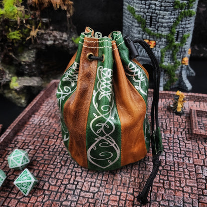 Handcrafted tan and deep green buffalo hide standing round D&D dice bag with gilded Elven scrollwork design by Grimbeard Leather.